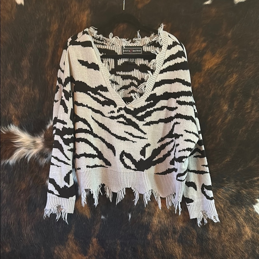 Black and White V-Neck Sweater with Distressed Edges